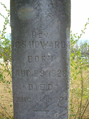 Tombstone in the cemetery for Rev. C. S. Howard born Aug 29 1828, died Aug 4 1871