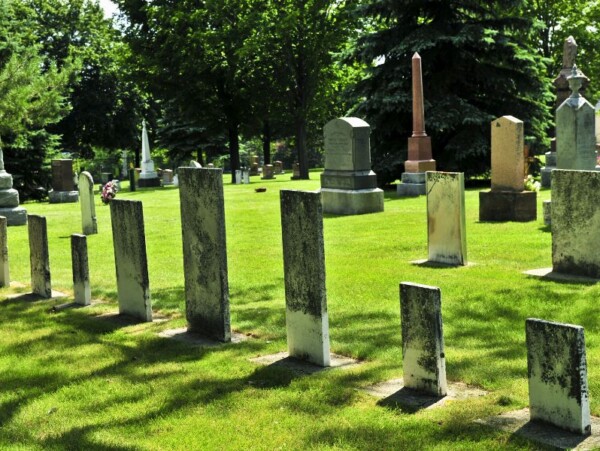 cemetery with row of old tombstones