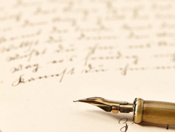 old document with old fashioned script and ink pen