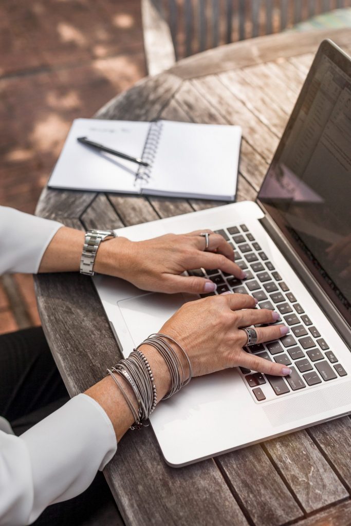 hands on laptop