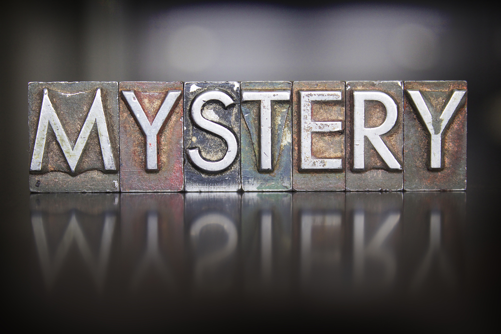 The word MYSTERY written in vintage lead letterpress type