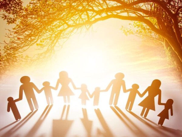 silhouette of family with orange light