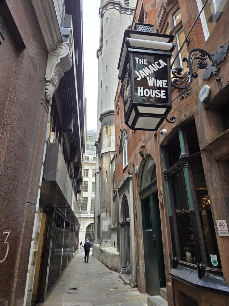 old narrow flagstone street in London